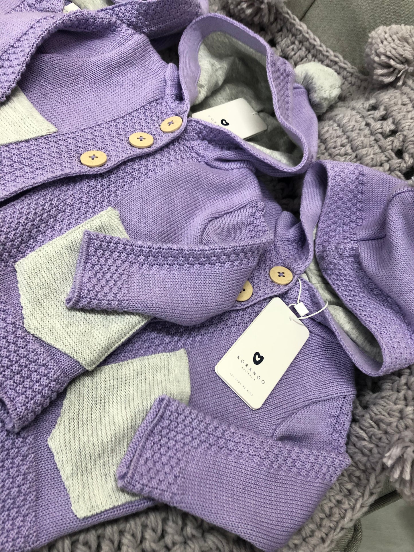 Korango Lavender Knit Jacket with Contrast Pockets and Pom Pom