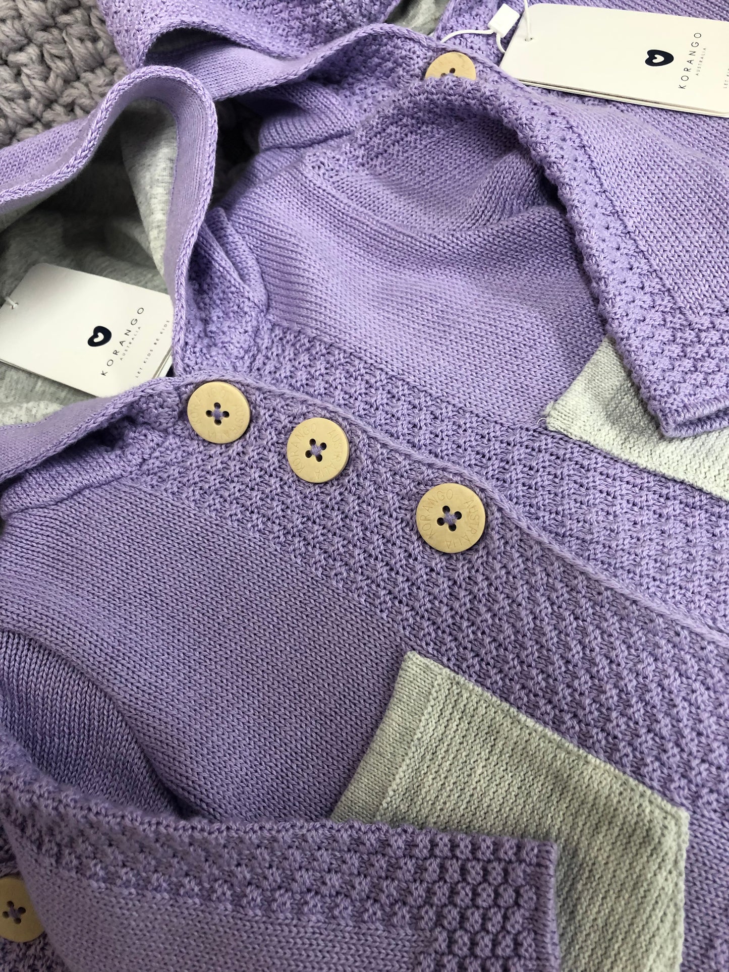 Korango Lavender Knit Jacket with Contrast Pockets and Pom Pom