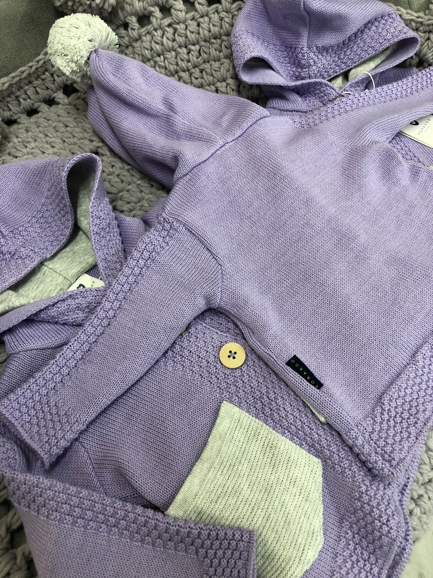 Korango Lavender Knit Jacket with Contrast Pockets and Pom Pom