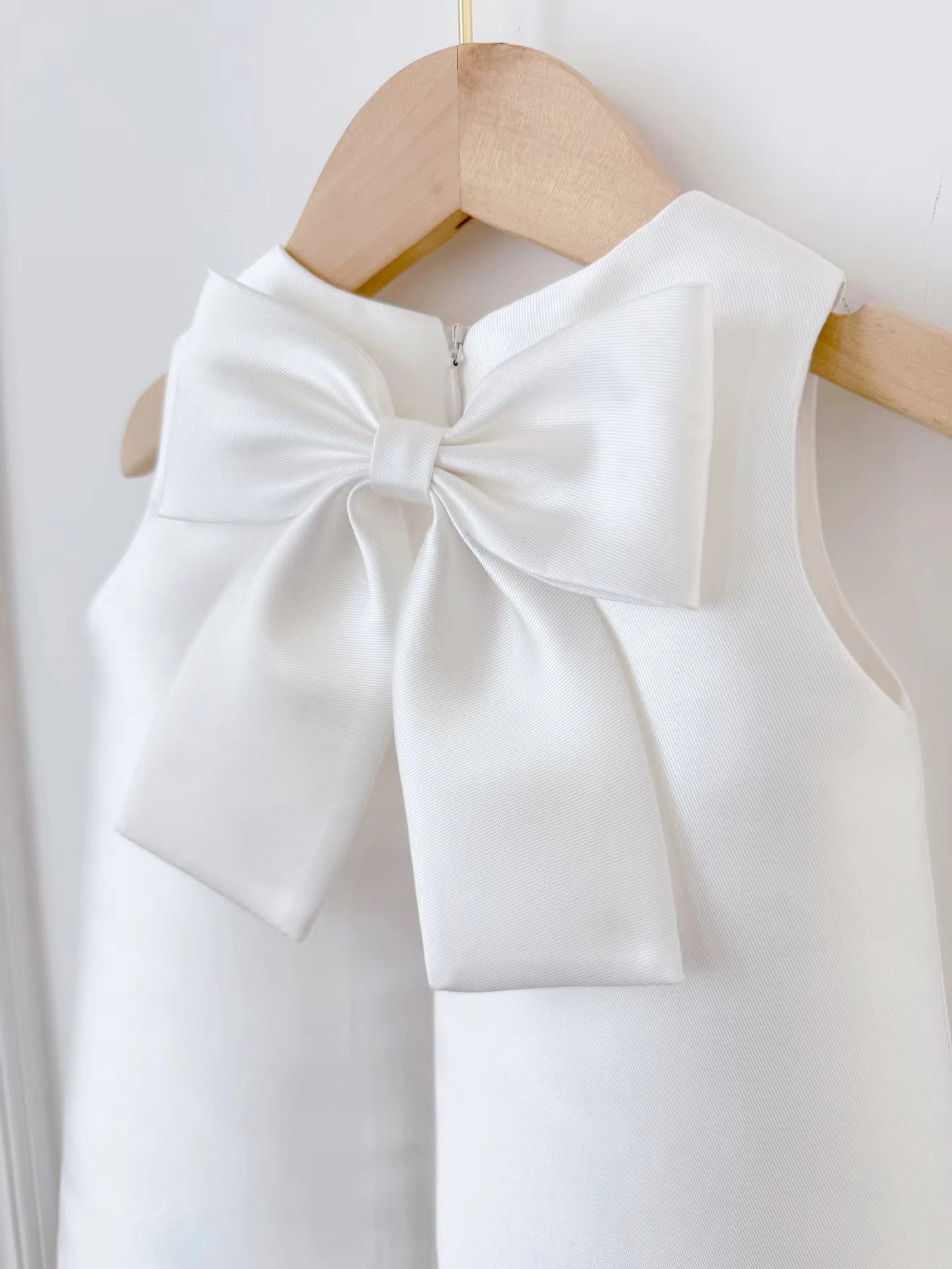 Sadie’s Satin & Bows Dress available in Pink or White