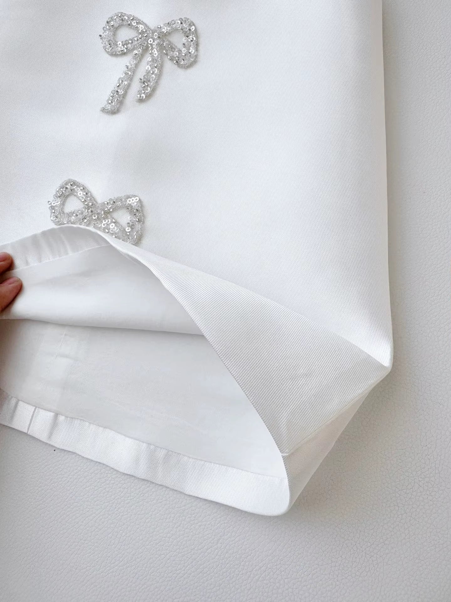 Sadie’s Satin & Bows Dress available in Pink or White
