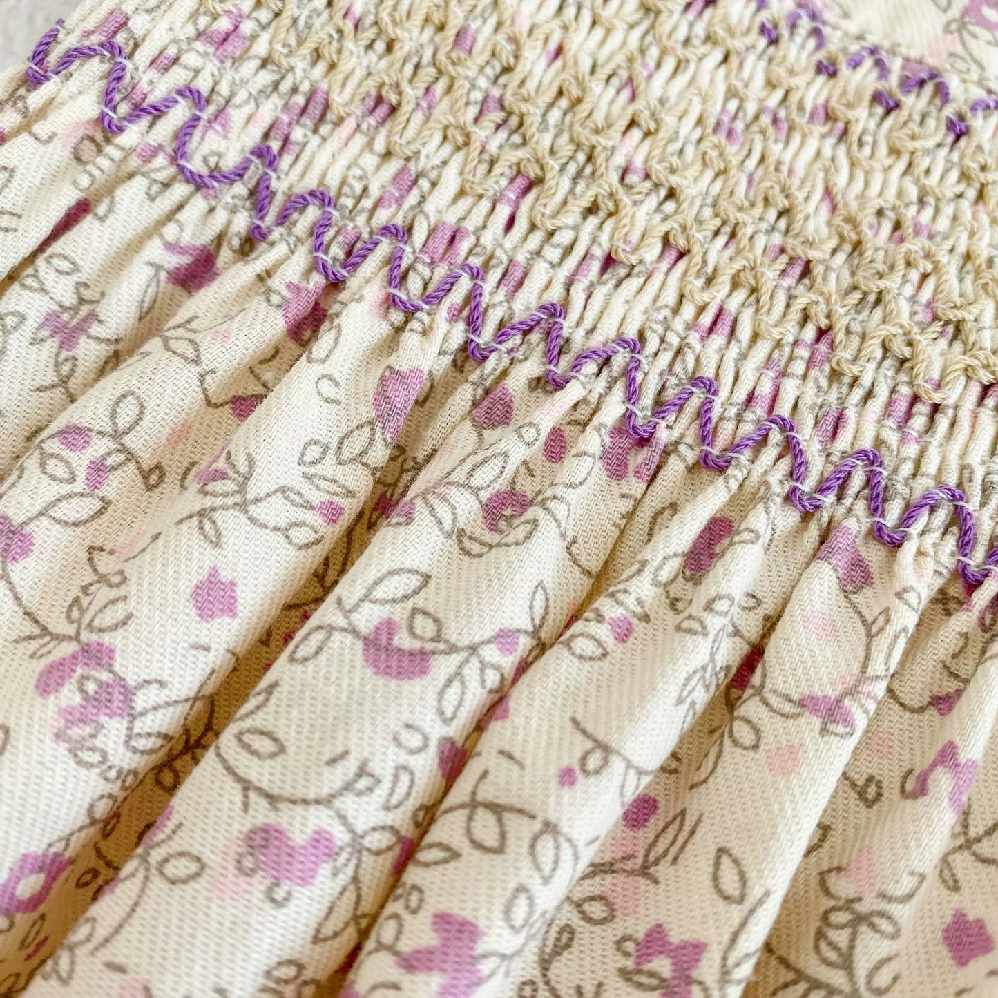 Avery’s Lilac Smocked Dress