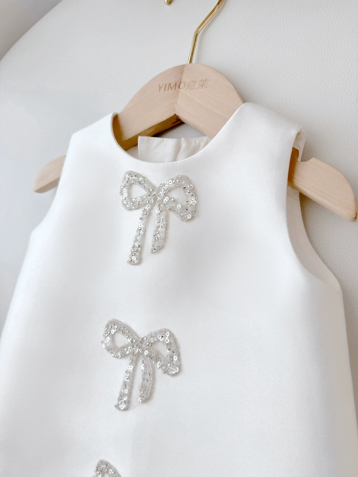 Sadie’s Satin & Bows Dress available in Pink or White