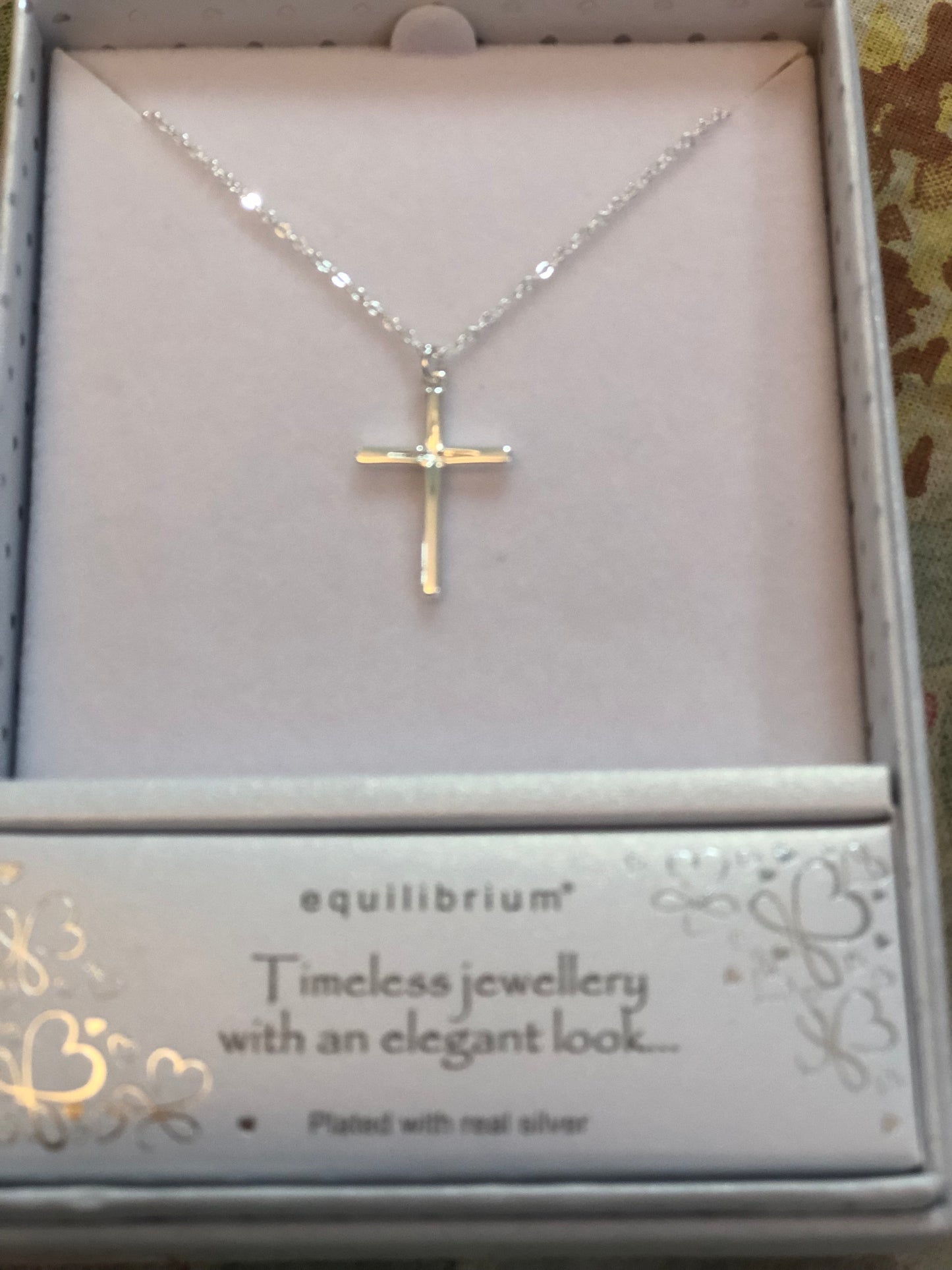 Equilibrium Cross Necklace Collection