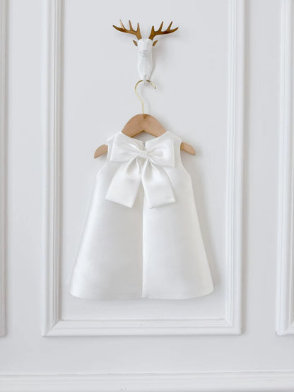 Sadie’s Satin & Bows Dress available in Pink or White