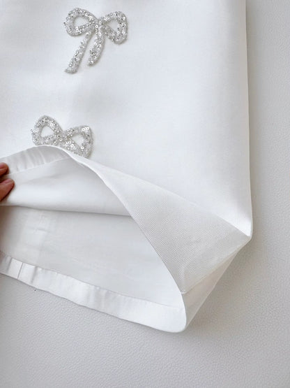 Sadie’s Satin & Bows Dress available in Pink or White