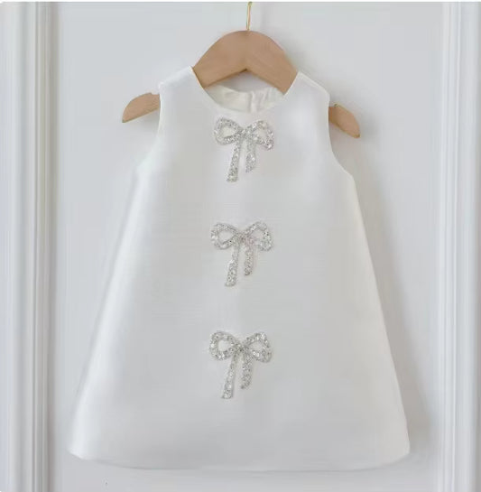Sadie’s Satin & Bows Dress available in Pink or White