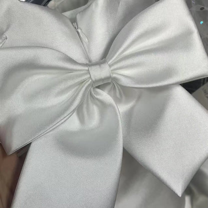 Sadie’s Satin & Bows Dress available in Pink or White