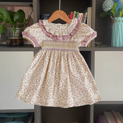 Avery’s Lilac Smocked Dress