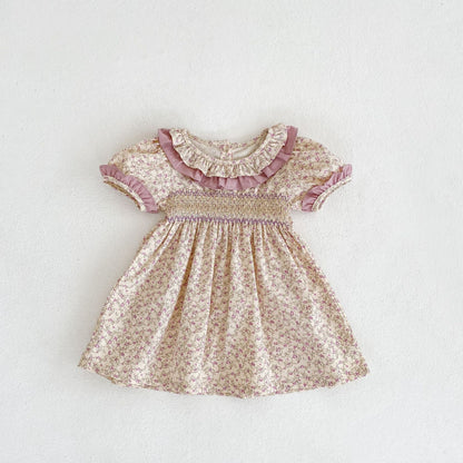 Avery’s Lilac Smocked Dress