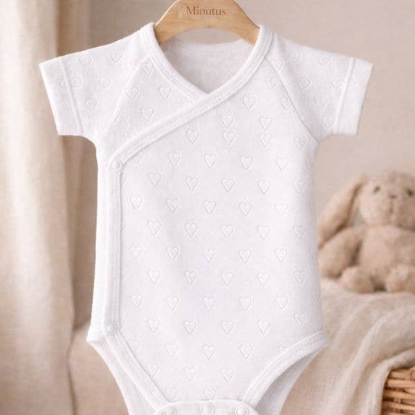 Newborn crossover bodysuit 100% textured cotton with hearts